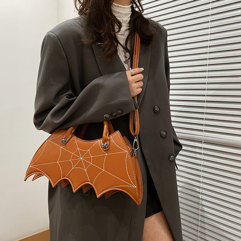 Spooktacular Style: Halloween-Inspired Spider Web &amp; Batgirl Shoulder Bags