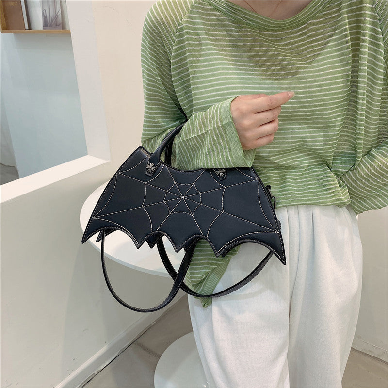 Spooktacular Style: Halloween-Inspired Spider Web &amp; Batgirl Shoulder Bags