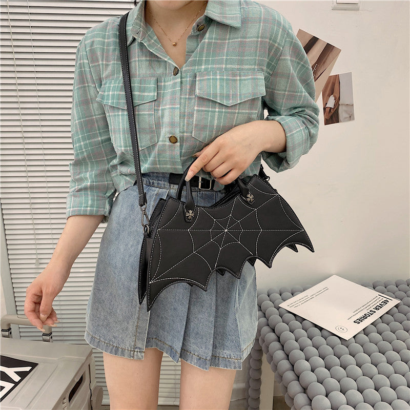 Spooktacular Style: Halloween-Inspired Spider Web &amp; Batgirl Shoulder Bags